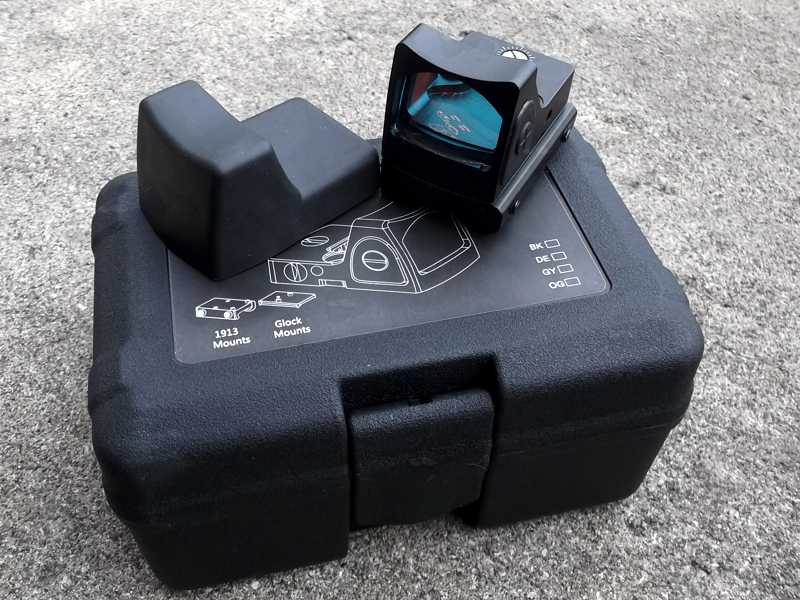 SOTAC RMR Base Sized Mini Reflex Sight with Brightness Settings Shown on Top of it's Hard Plastic Storage Case
