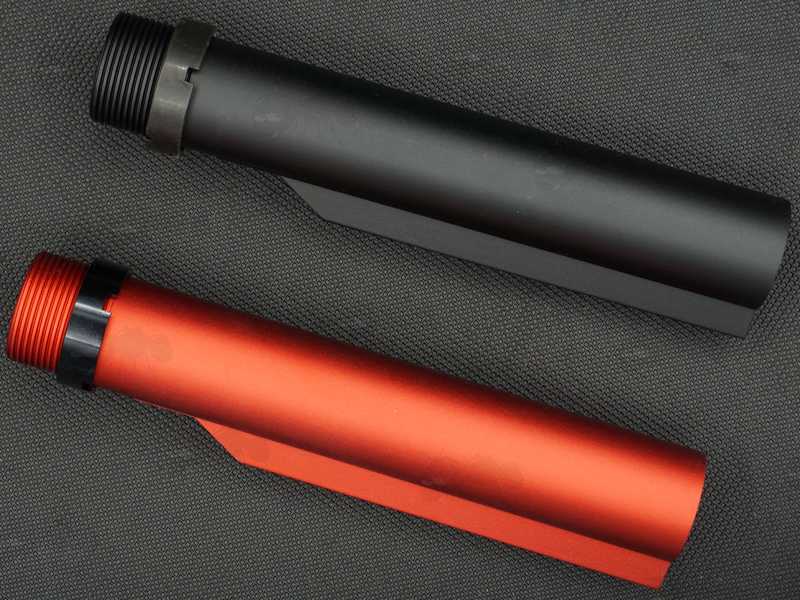 One Black and One Red Anodised All Metal Airsoft Mil-Spec Buffer Stock Tubes with Castle Nuts Fitted
