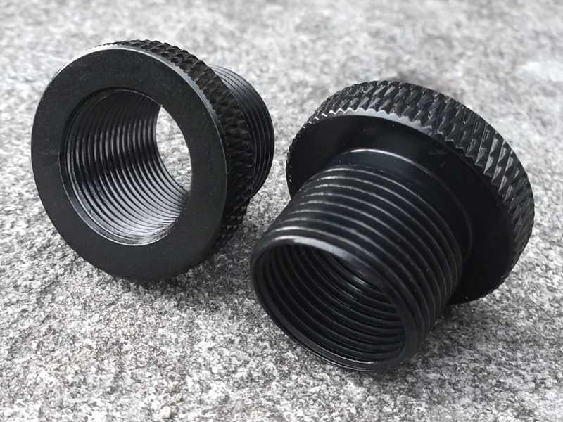 Internal and External Thread View of A Pair of M14x1RH Thread to 5/8x24 Rifle Silencer Adapters