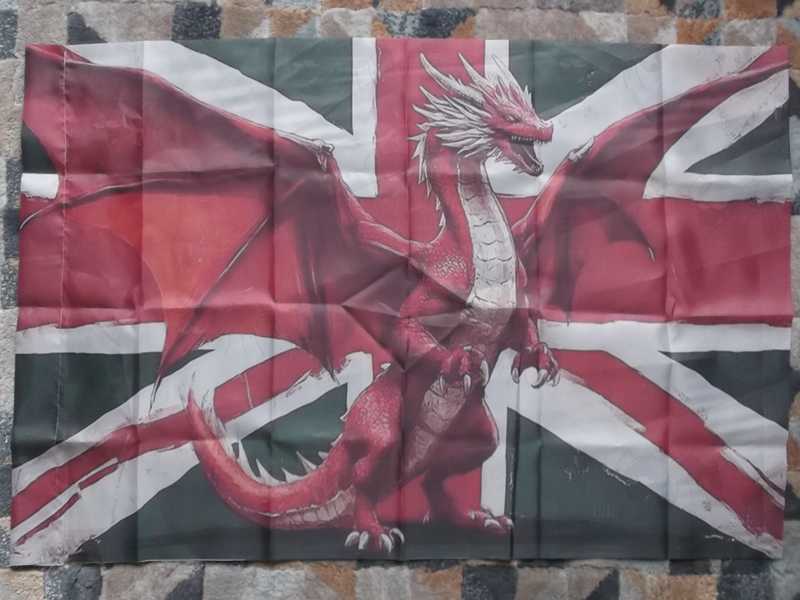 Union and Fierce Upright Red Dragon Flag Combination, with Green Valley Background Colour, Shown on a Flag Pole