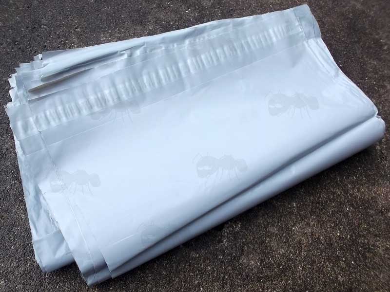 One Hundred Grey Plastic Self Adhesive Mailing Bags