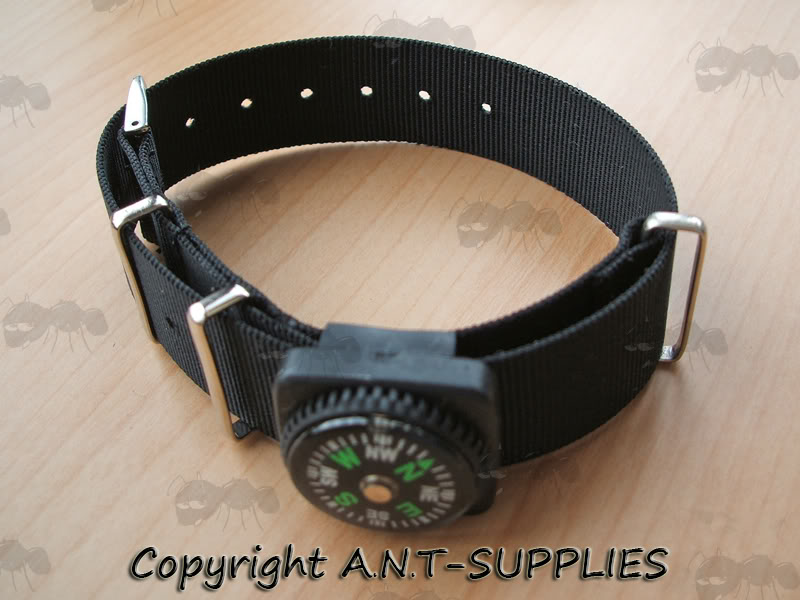 Button Compass with Buckle Strap Fitting On a Black Watch Strap