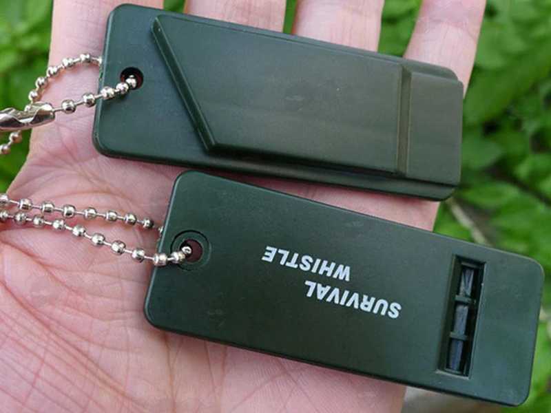 Back and Front View of The Triple Frequency Green Coloured Flat Design Signal Whistle with Metal Ball and Chain Keychain