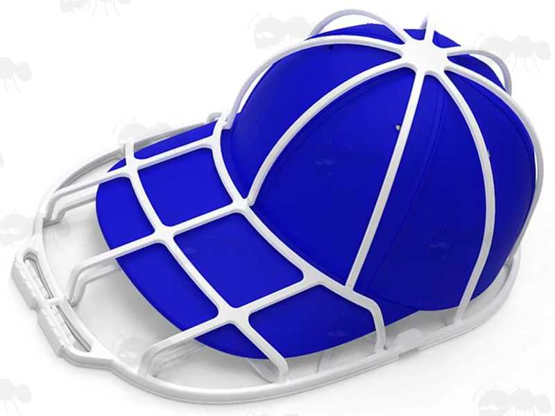 White Plastic Cage, Shown Holding a Blue Baseball Cap