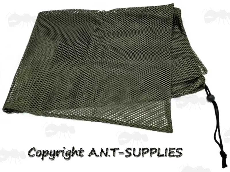 Green Mesh Decoy Carry Bag with Drawstring and Shoulder Straps, Shown Laid Folded Flat