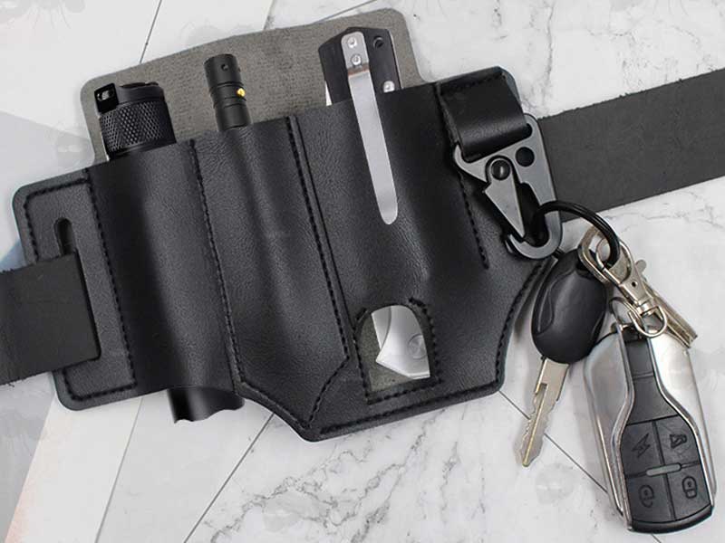 Black Imitation PU Leather Belt Loop Fitting Multi-Tool Holster Organiser Pouches Shown Fitted on a Belt, with Pocket Knife, Pen, Torch and Car Keys