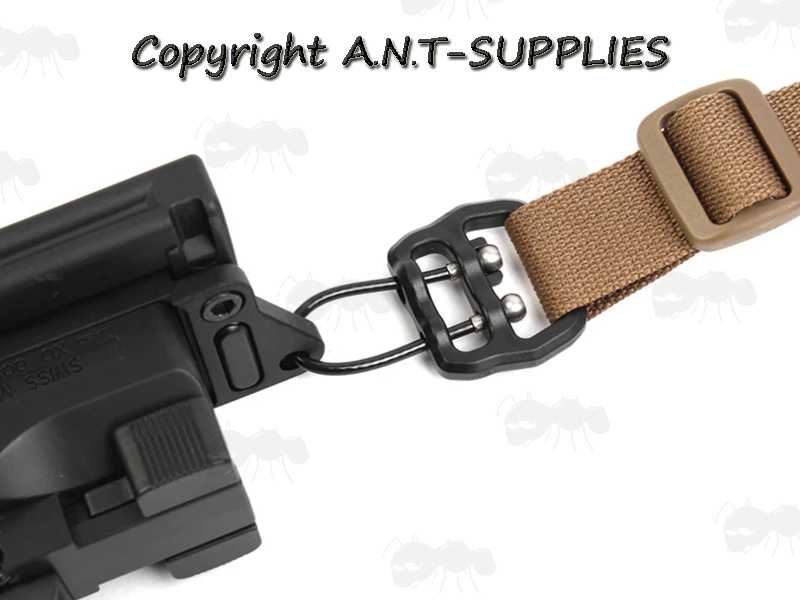 Aluminium Fitting Sling Block with a Steel Cable with Black Plastic Coating, Shown in Use on a Dark Earth Coloured Sling