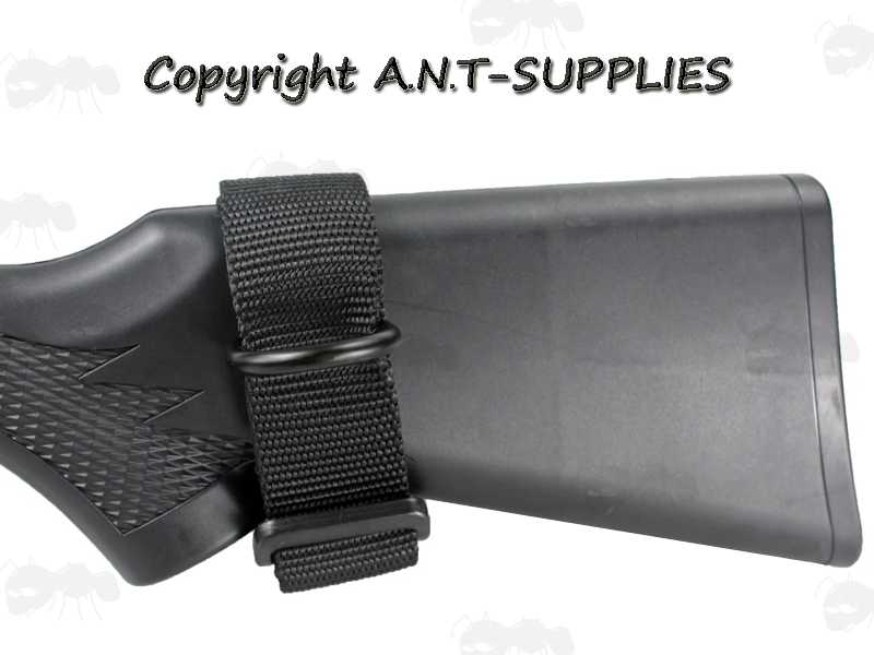 Black Universal Nylon Loop Gun Sling Adapter for a Rifle Buttstock, Shown Fitted to Black Polymer Stock