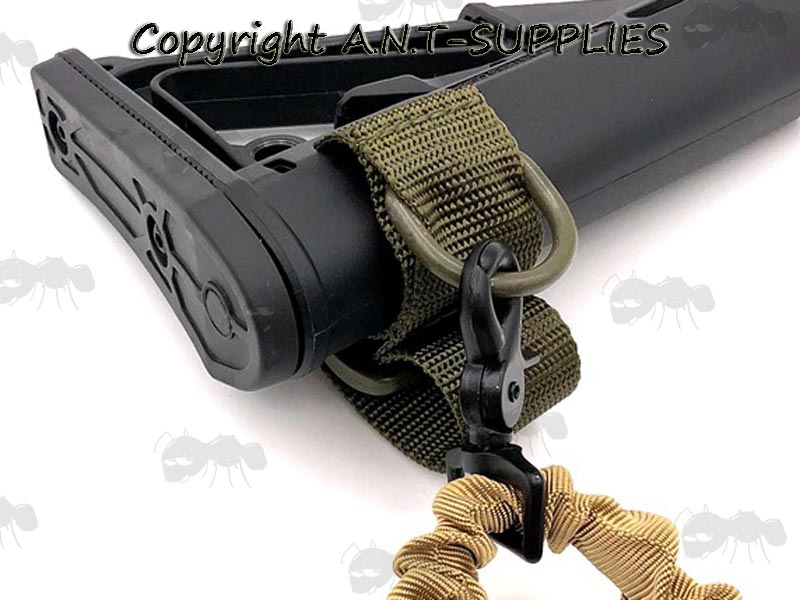 Green Universal Nylon Loop Gun Sling Adapter with One Point Bungee Sling Fixed to a Rifle Buttstock
