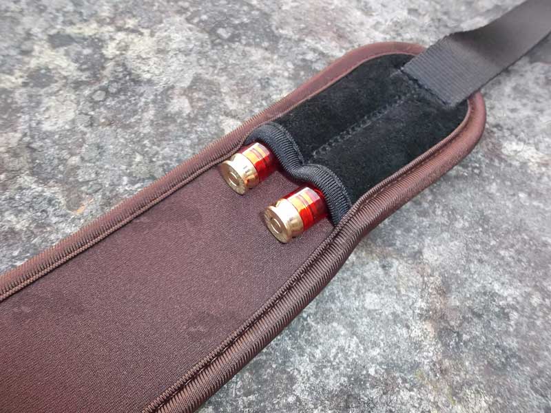 Close Up View of The Cartridge Pockets On The Brown Canvas Hunters Sling with Sewn-In Black QD Swivels