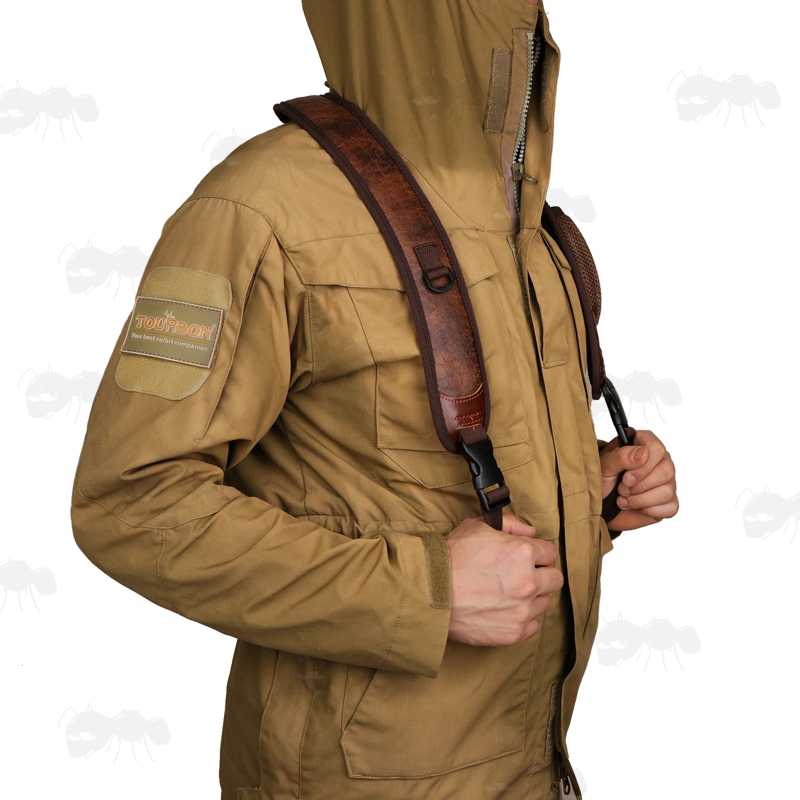 Brown TU Leather and Black Neoprene Padded Hunting Gun Back Harness Sling Fitted with Black Metal QD Swivels and Plastic Side Release Buckles, In Use