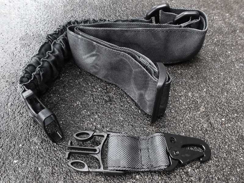 Close-Up View of The QD Buckle End Tab on The Dark Reptile Camo Single Point Bungee CBQ Quick-Release Rifle Sling