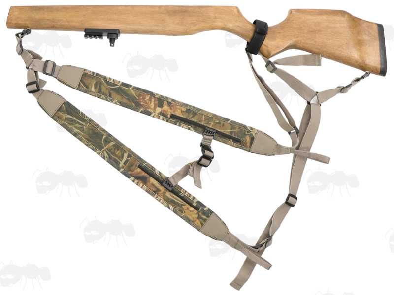 Khaki Canvas and Reed Camouflage Neoprene Backpack Harness Style Rifle Sling Shown Attached to a Wooden Rifle Stock