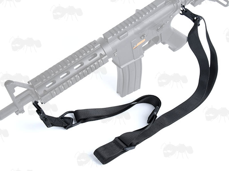 Black Two Point Multi Rifle Sling in Two Point Setup with Metal Clip On Fittings Clipped to Tactical Rifle