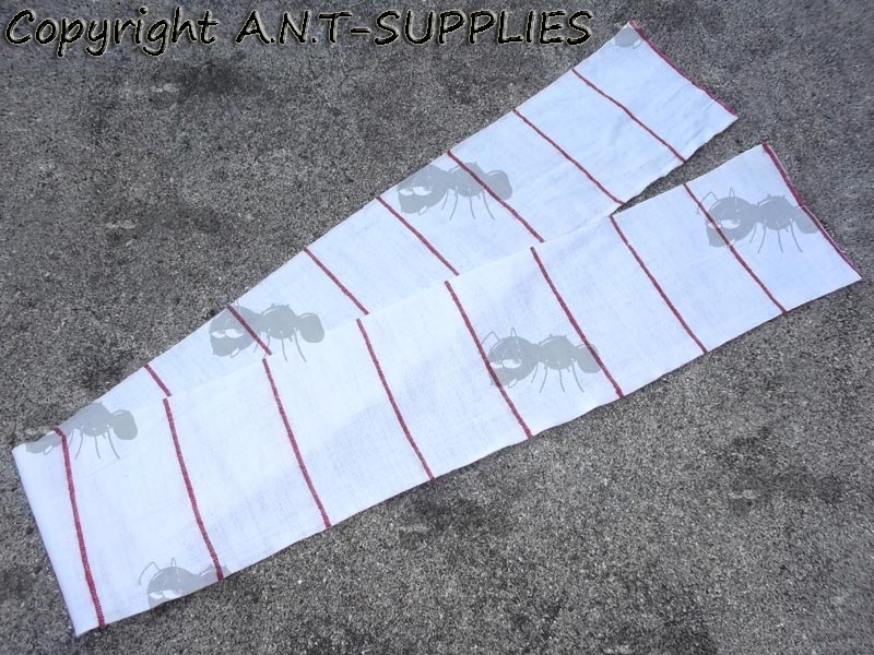 One Yard of White Fabric Cloth of 4x2 Shotgun Barrel Cleaning Patches with Red Cutting Lines at Every 2 Inches