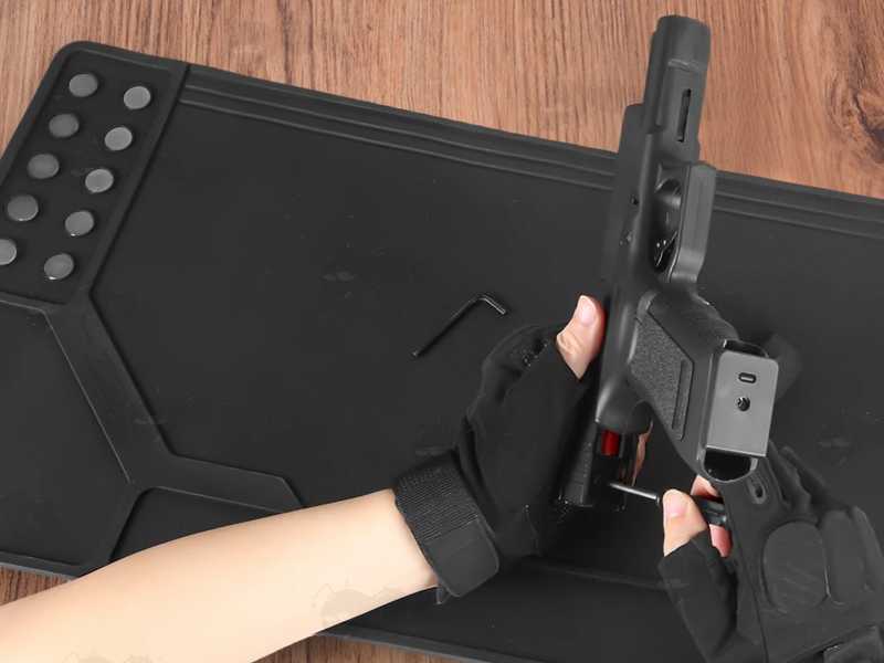Black Coloured Rubber Rifle / Shotgun Sized Cleaning / Maintenance Mat with Moulded Compartments for Parts and Magnetic Section, Shown in Use