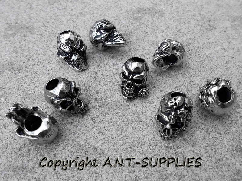 Set of Eight Metal Skull Beads with Assorted Designs