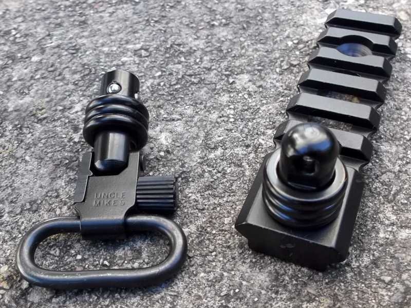Two QD Push Button Swivel Socket to QD Stud Adapter and Uncle Mikes Swivel with The Six Slot Length of Picatinny Rail with a 10mm Socket Swivel Port