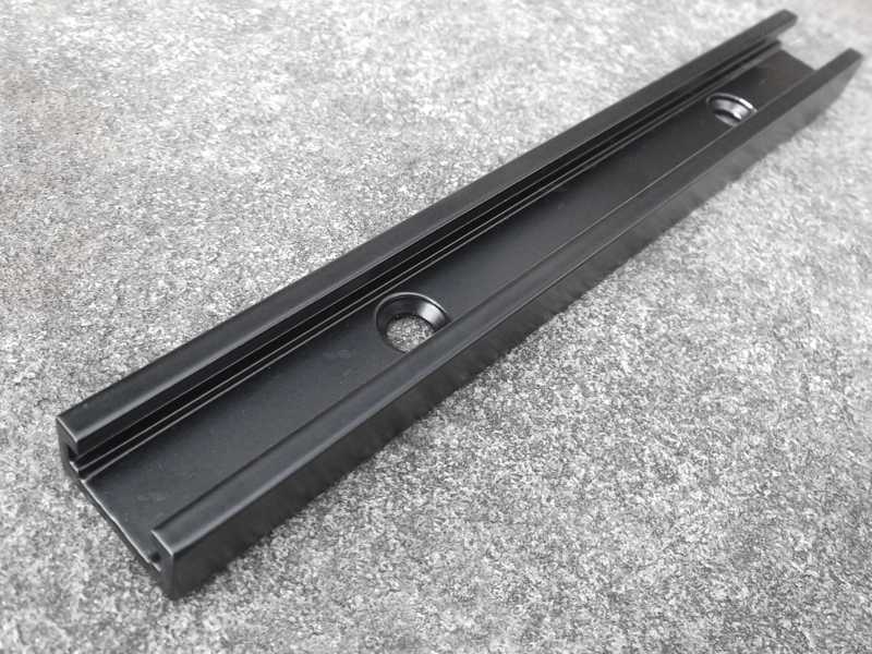 Top View of The Black Anschutz / Euro / UIT Forend T-Channel Accessory Rail, 15cm Long