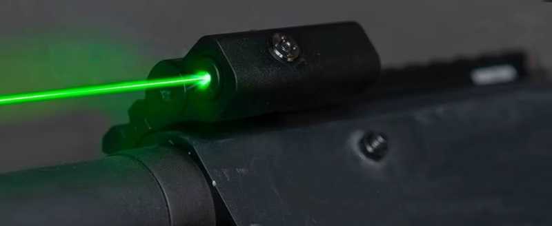 140mm Long Weaver / Picatinny Sight Rail with 13 Slots and High-Powered Green Laser Sight, Shown Fitted to a Mossberg Shotguns