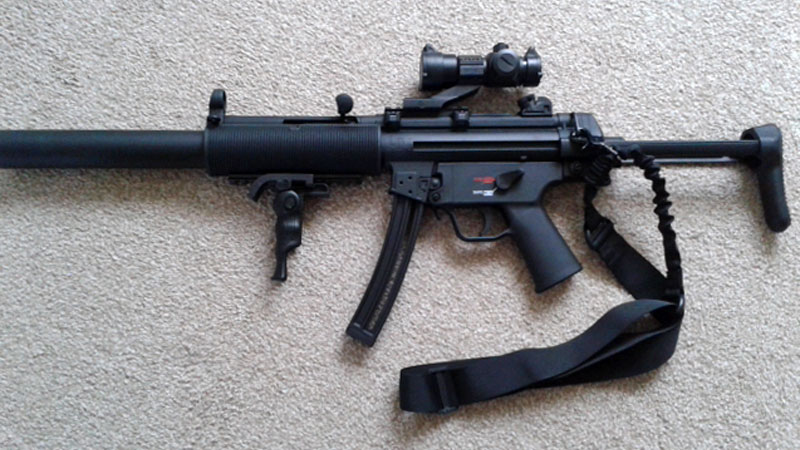 .22 Rimfire MP5 SD Fitted with a Black One Point Bungee Sling, and DIY Handguard Weaver Rail with Folding Vertical Grip