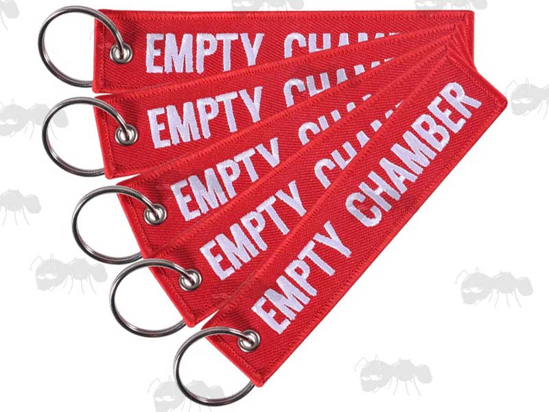 Five Red Gun Safety Keyrings with Embroidered White Thread Empty Chamber Text
