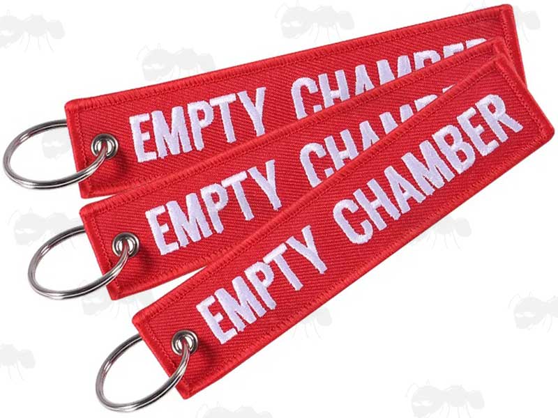 Three Red Gun Safety Keyrings with Embroidered White Thread Empty Chamber Text