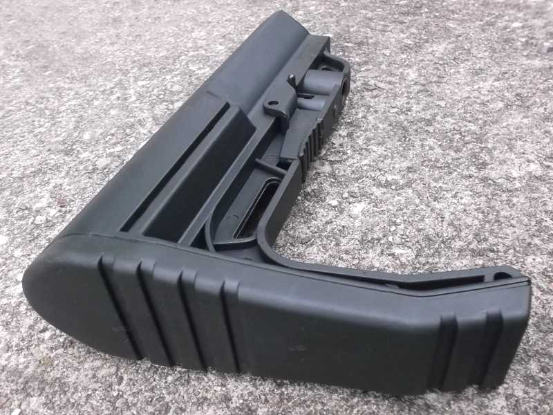 Shoulder Butt Pad View of The Minimalist Style Black Polymer Collapsible Tactical Rifle Buttstock