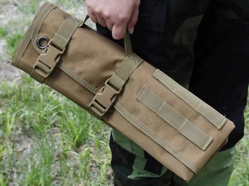 Roll-Up Tan Coloured Shooting Mat, Shown Being Carried