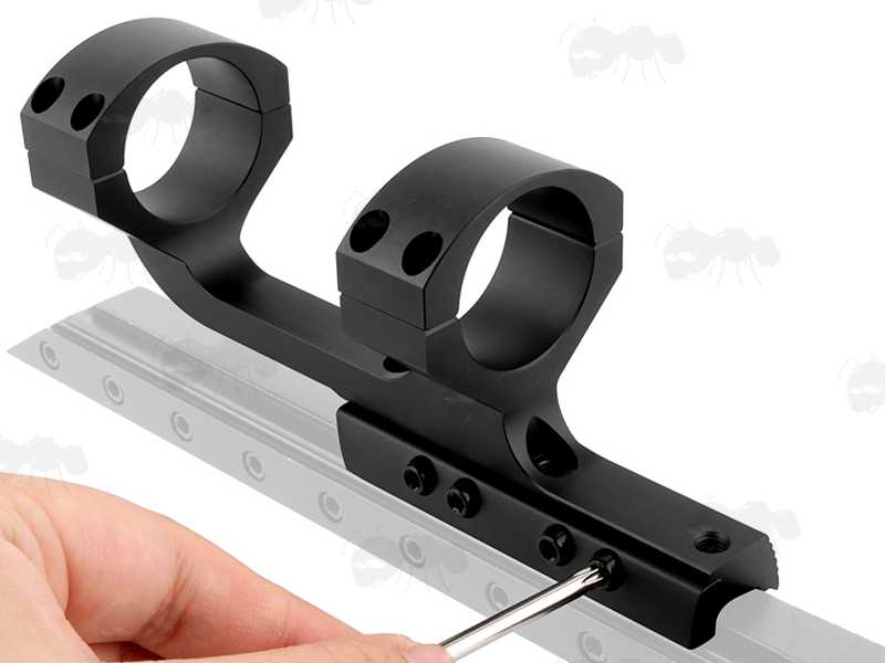 Extended Reach One Piece Dovetail Rail Scope Mount for 30mm Scope Tubes, with Three Scope Creep Stopper Grub Screw Pins, Shown Being Fit to a Rail