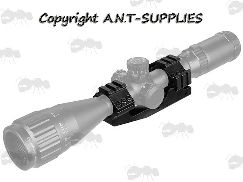 The Dovetail Rail One Piece Extended Reach 30mm Ring Scope Mount with Accessory Weaver / Picatinny Top and Tri Rails, SHown Fitting to a Rifle Scope
