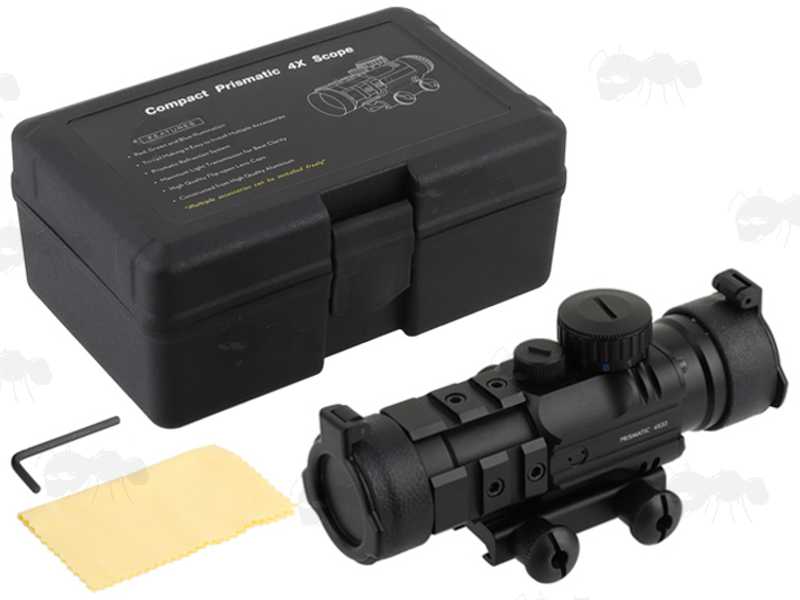 Illuminated 4x32 Prismatic Rifle Scope with Accessory Rails, Shown with Allen Key, Lens Cloth and Hard Plastic Storage Case