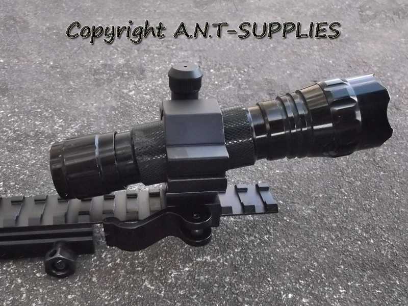 Weaver / Picatinny Gun Rail Mount with Rotating 25mm Tube Ring for Adjusting the Elevation and Windage, Shown Fitted with Torch at Maximum Elevation