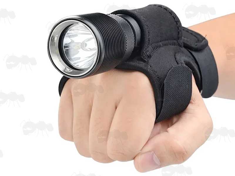 Divers' Wrist or Arm Fitting Torch Holder, Shown with Compact Black Torch Fitted on Hand